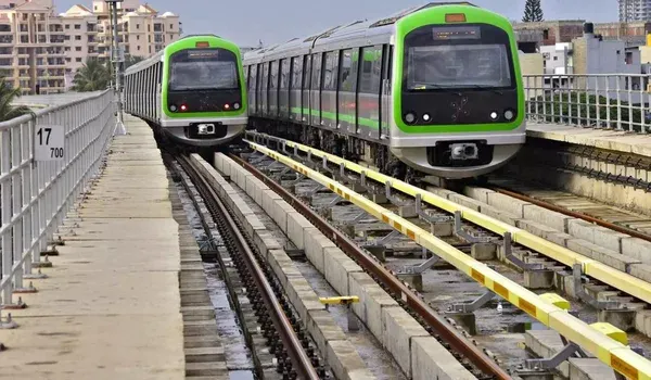 Blue Line metro connectivity near Prestige Airport Road – to be verified Namma Metro trains on an elevated Bangalore metro line
