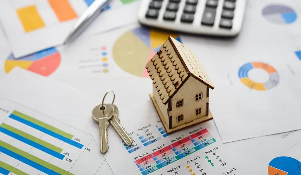 Planning the total cost of a Prestige Airport Road apartment House model, keys and cost charts representing apartment cost planning